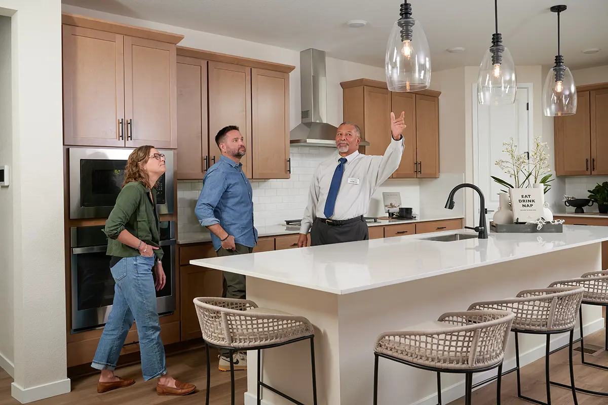 Couple being shown personalized options on a new home