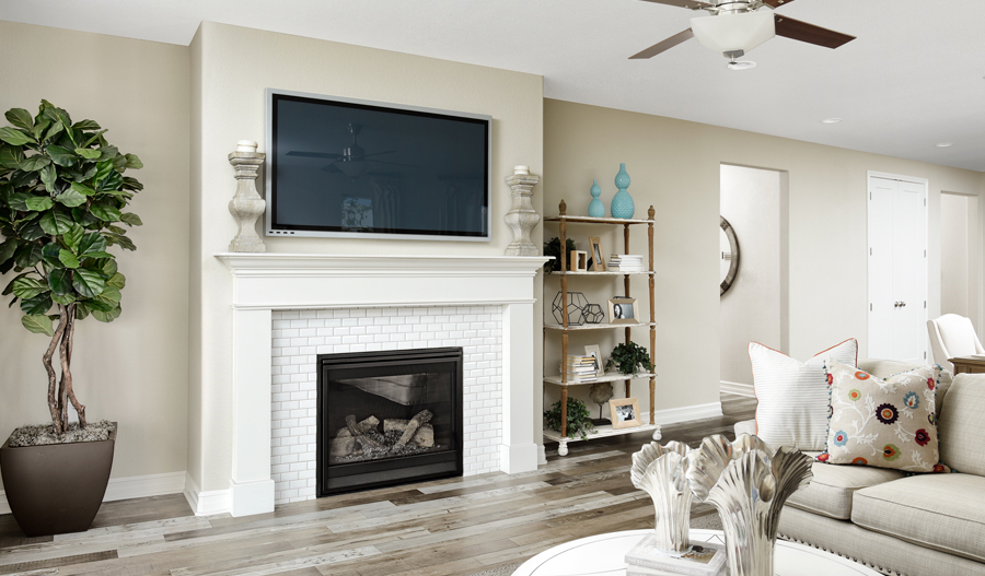 Family room of Arlington plan featuring fireplace and mantle
