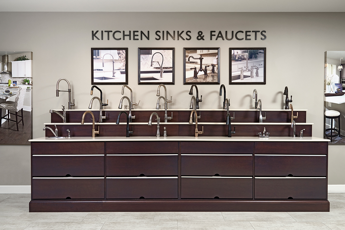 Home Gallery™ display of kitchen faucets in a variety of styles and finishes