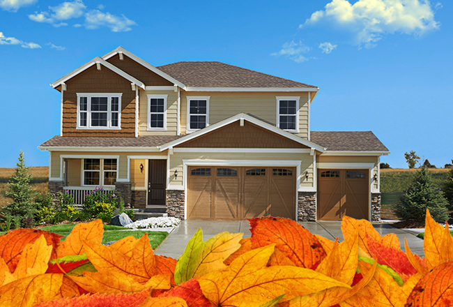 Exterior of two-story home and fall leaves