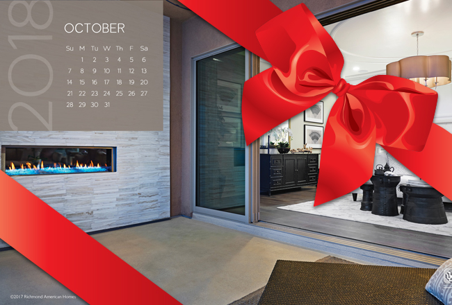 October 2018 Calendar above great room fireplace with red bow over image