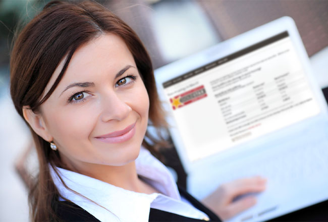 Woman sitting in front of computer