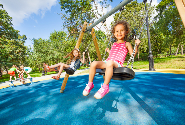 Children on swings at park