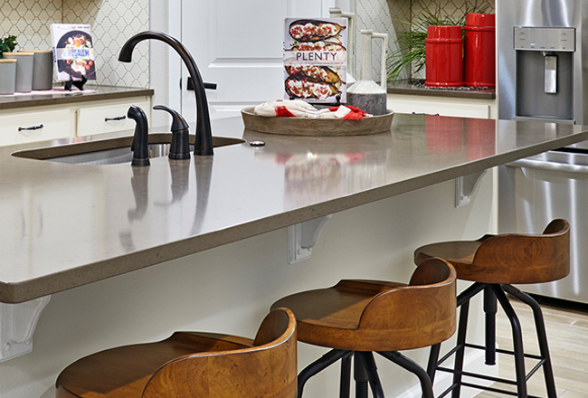 Barstools in front of kitchen island