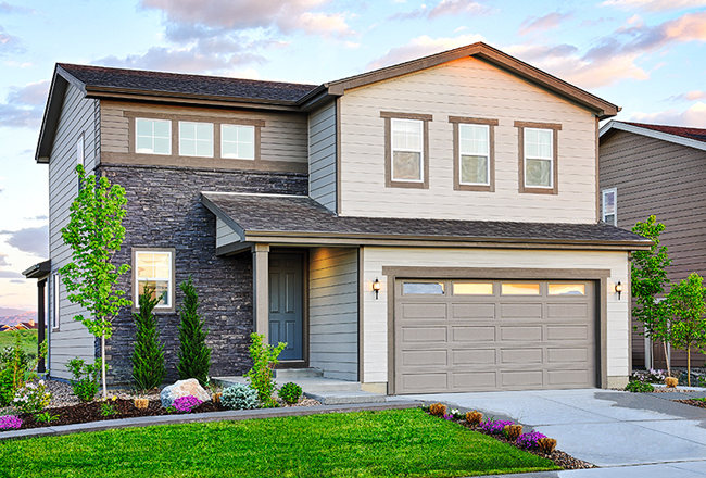 Exterior of two-story home with covered entry