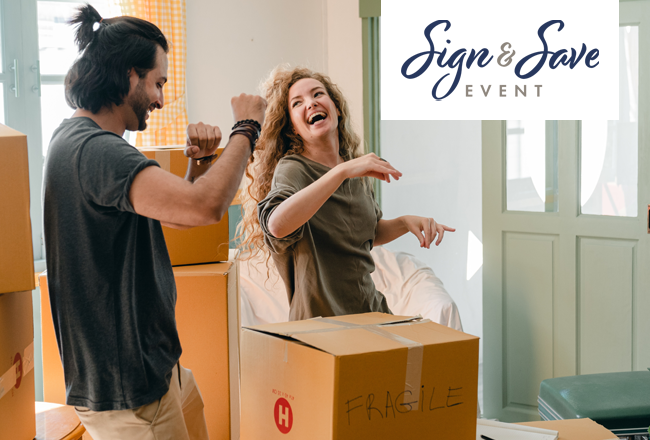 Couple packing boxes and moving | Sign & Save logo overlay