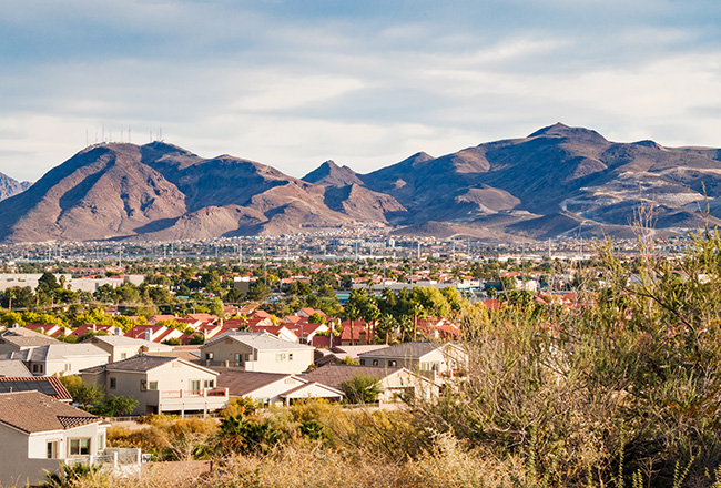 Aerial view of homes  with mountain backdrop in Henderson, Nevada