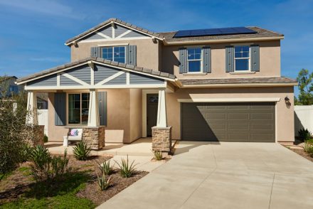 Home exterior with solar panels on the roof