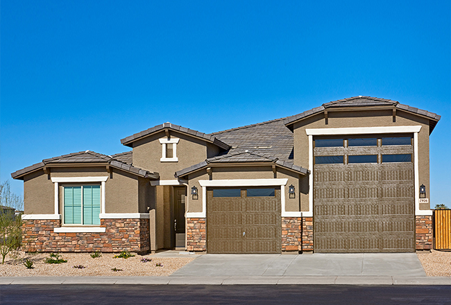 Copper model home with RV garage exterior