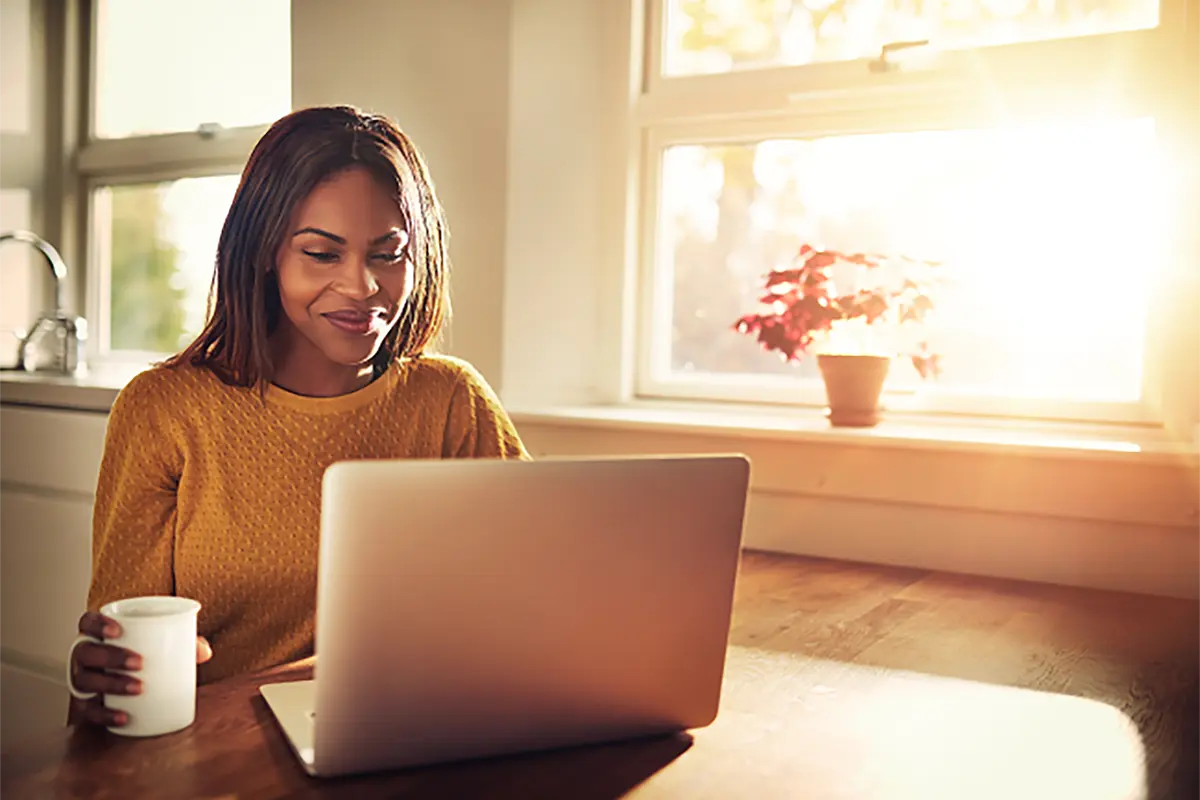 Woman sitting in front of her laptop