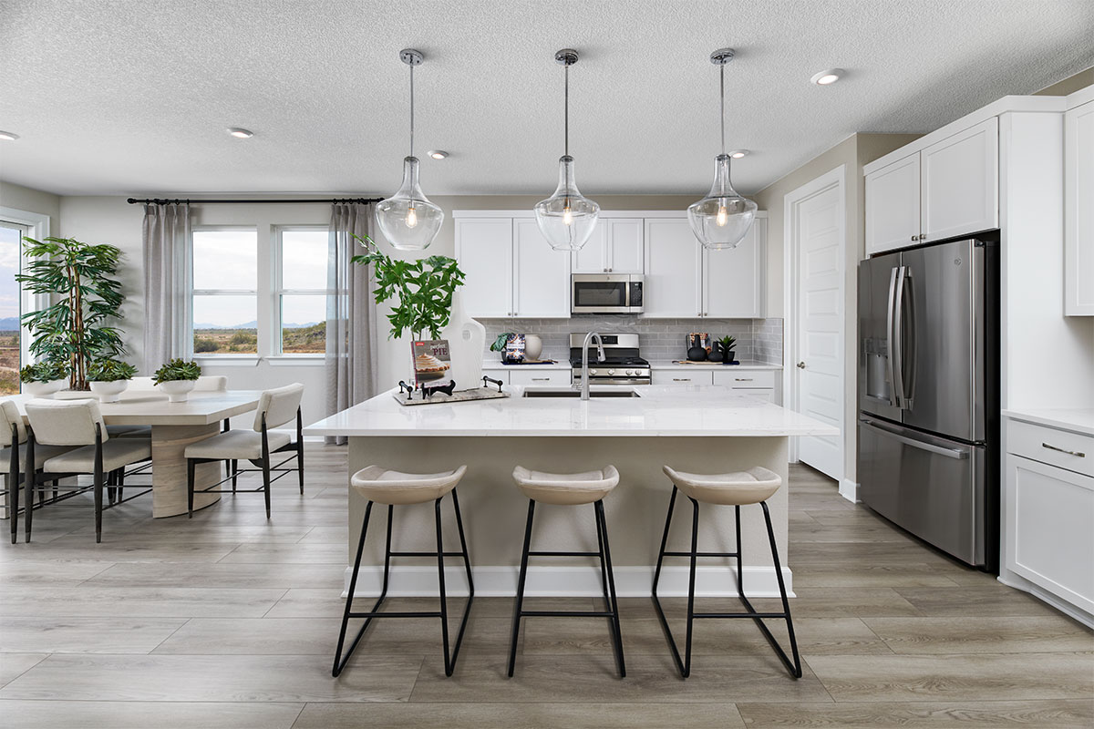 A well-appointed kitchen on the main level of a two-story floor plan