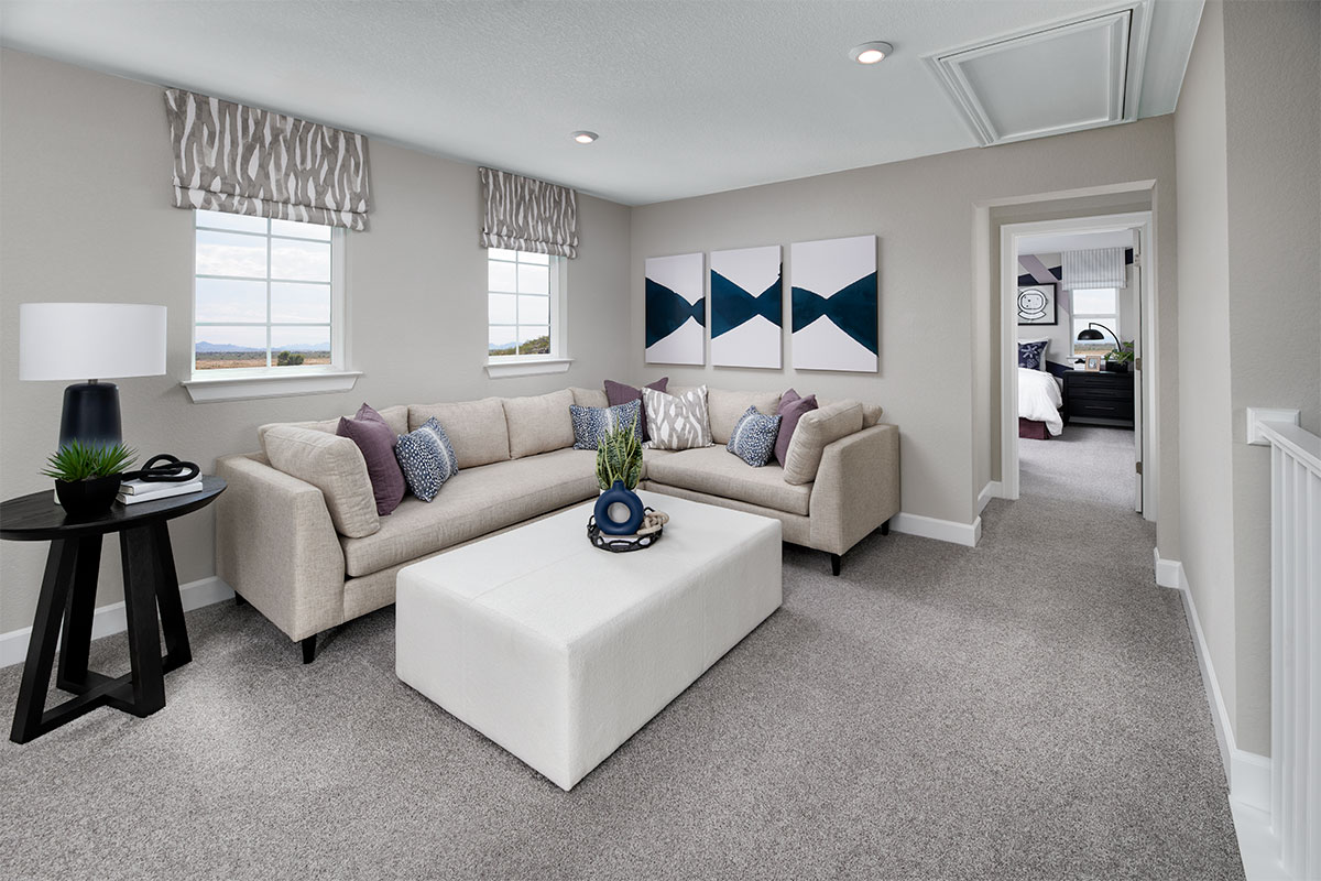 A spacious great room in a two-story floor plan