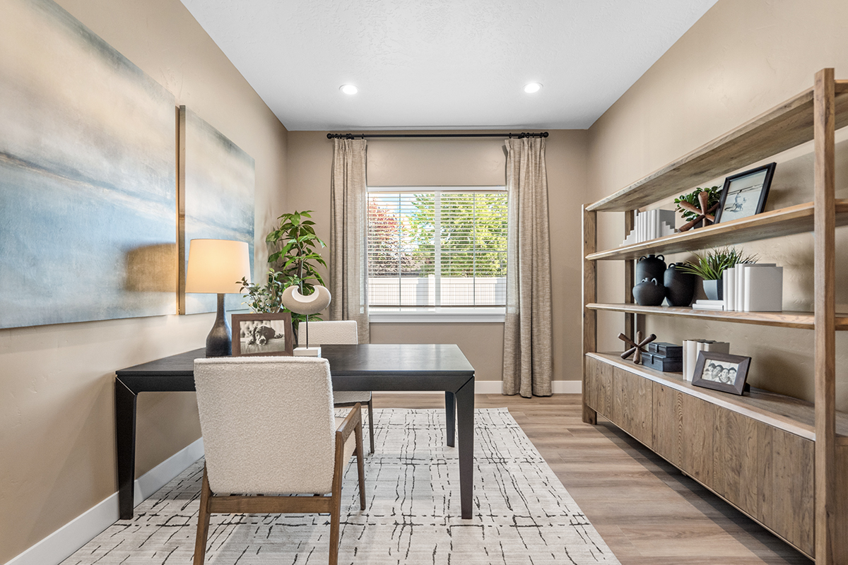 An inviting, light-filled study with neutral decor