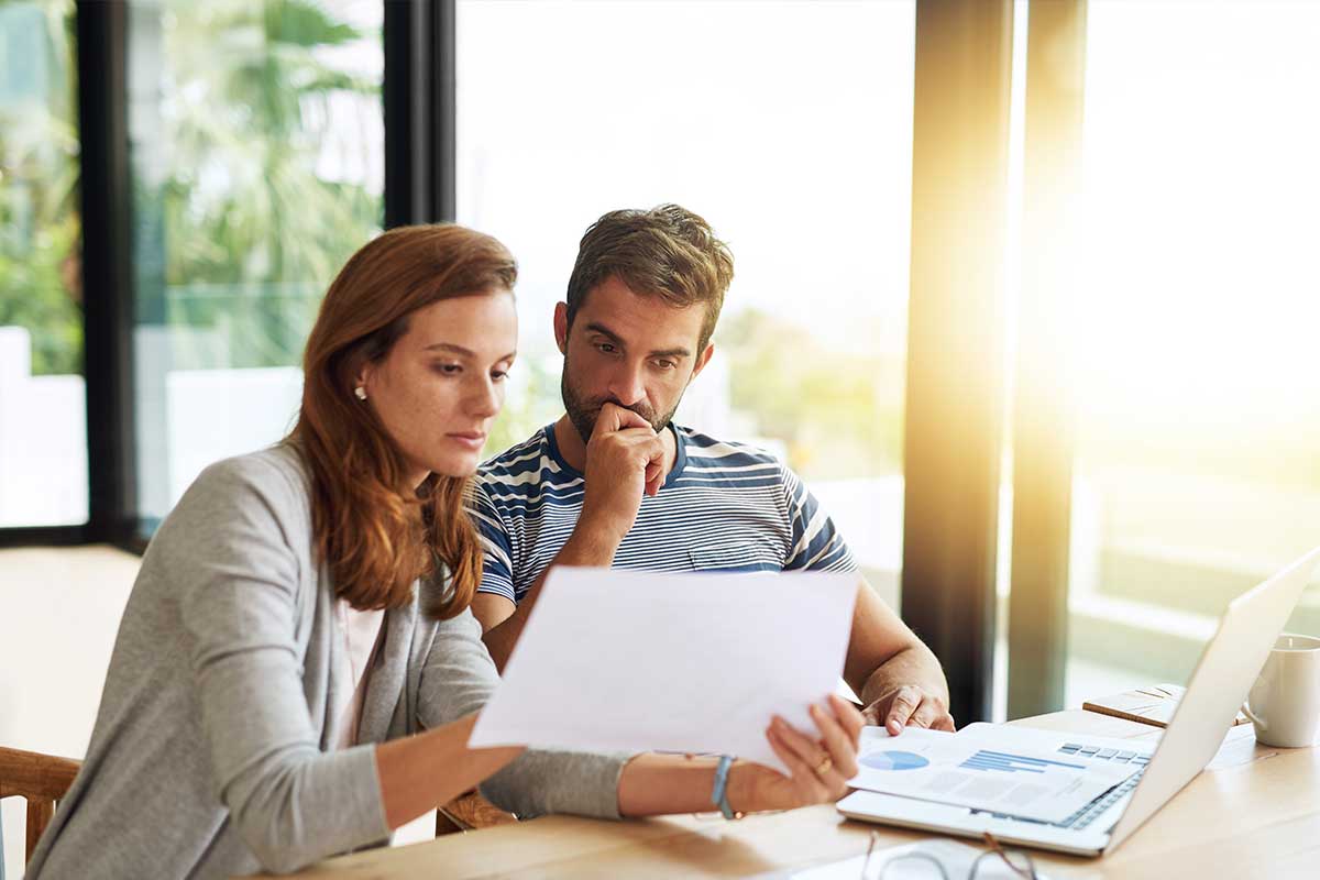 A couple reviewing their mortgage options