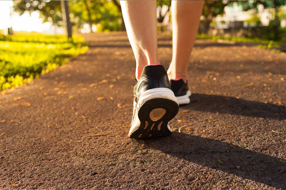 Someone walking on a neighborhood trail