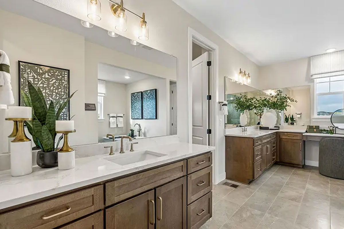 A Teton primary bathroom with dual vanities