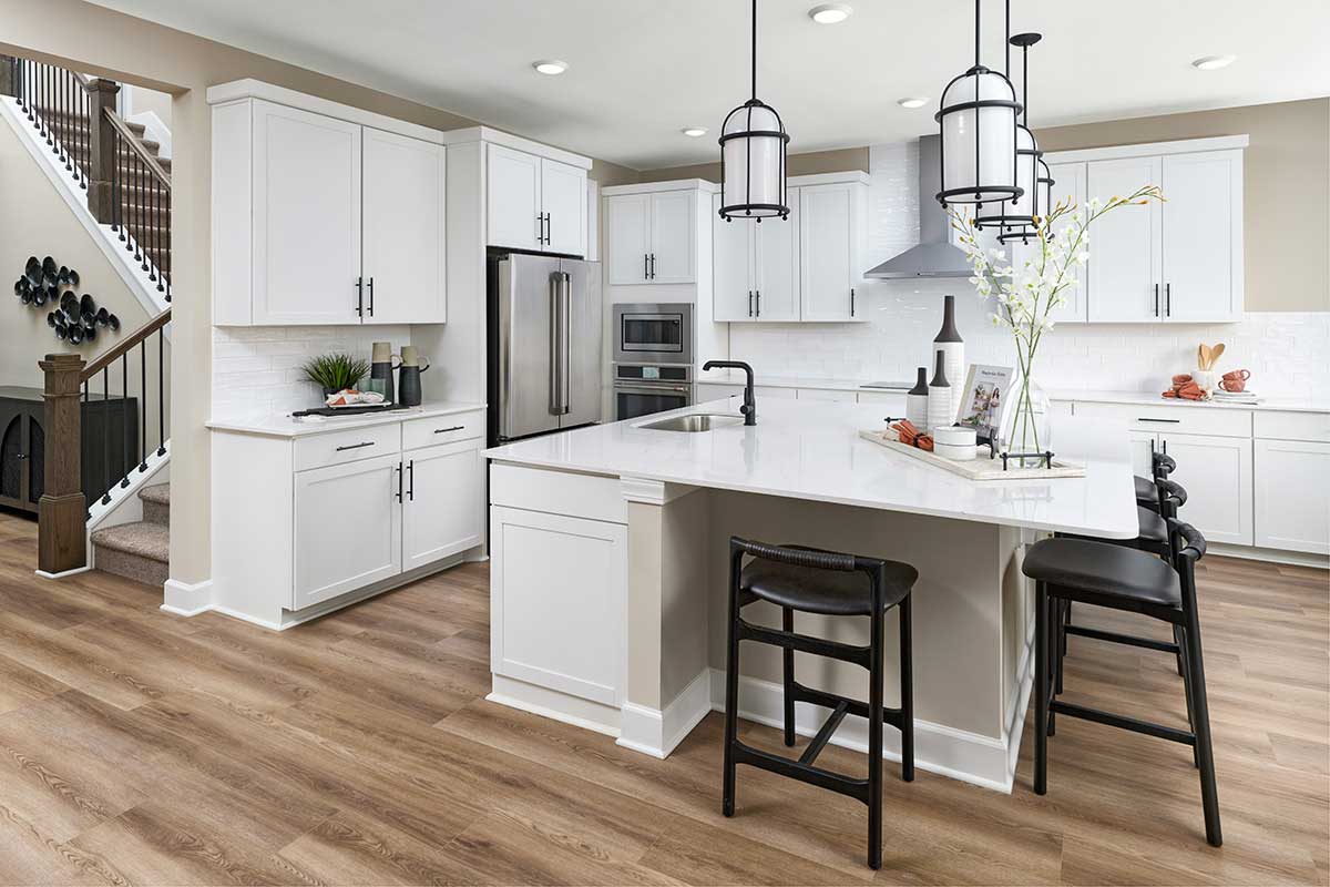 Well-appointed kitchen with white cabinets
