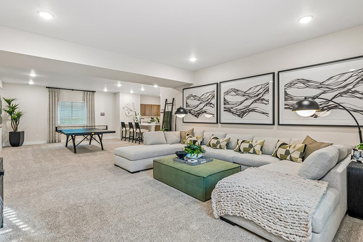 Finished basement with a large sofa