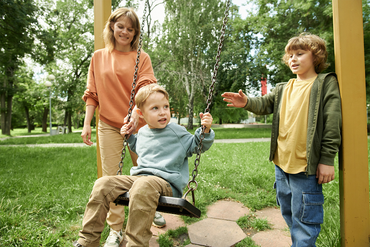 Child on a playground swing