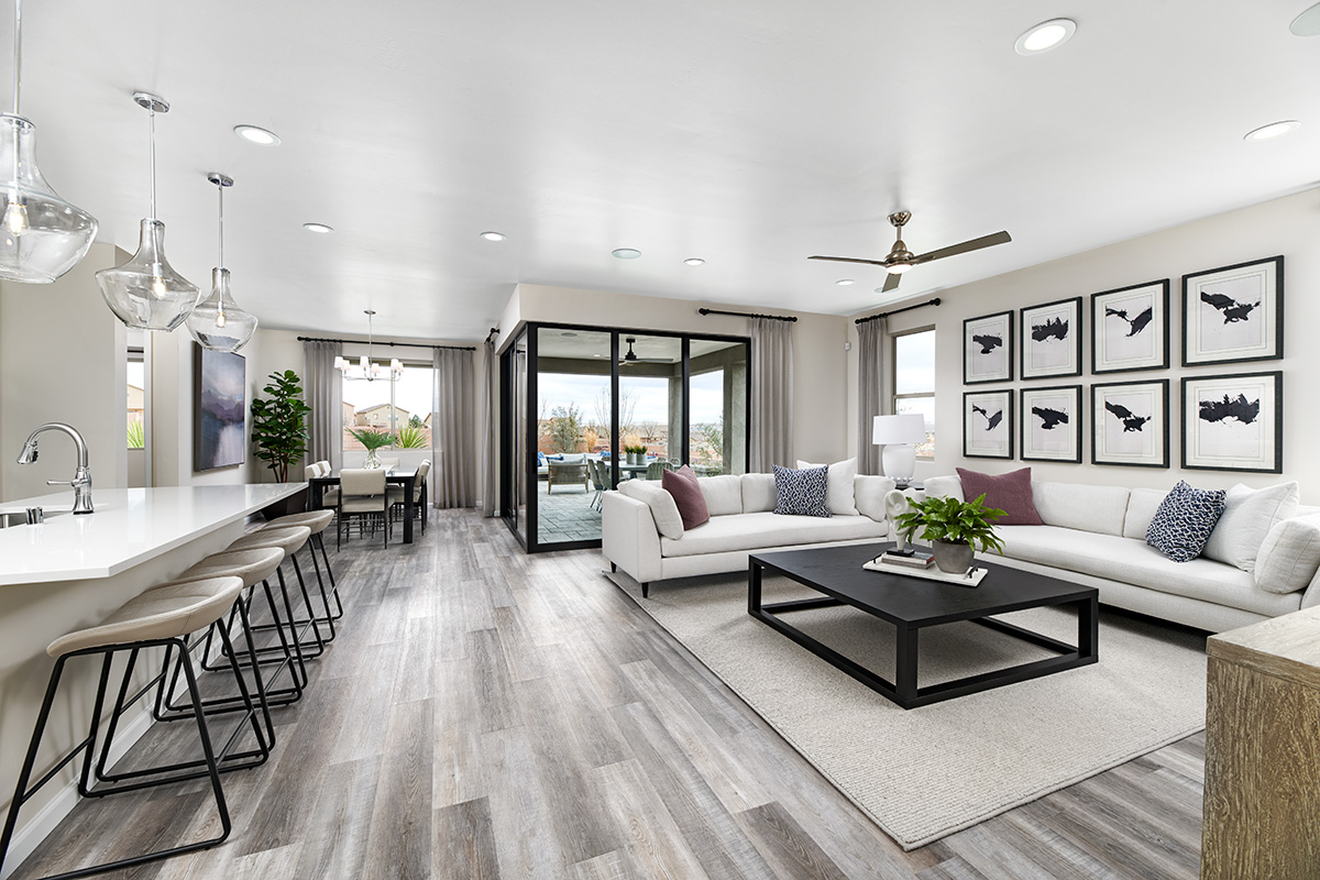 Open floor plan house layout featuring a great room, kitchen, and dining room