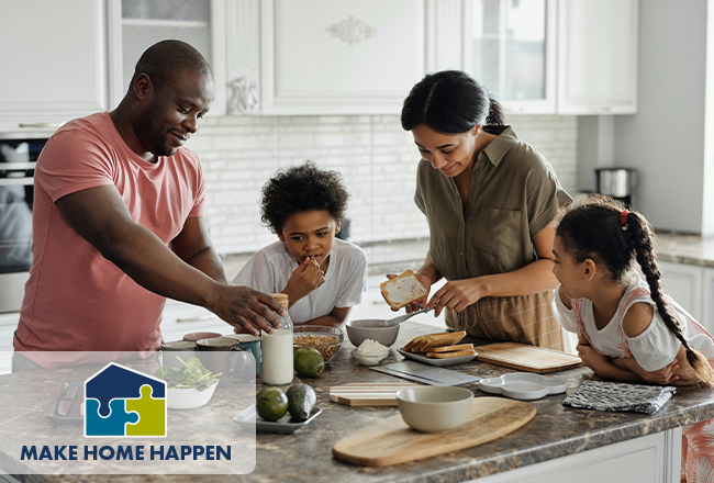 Family makiing lunch together in kitchen