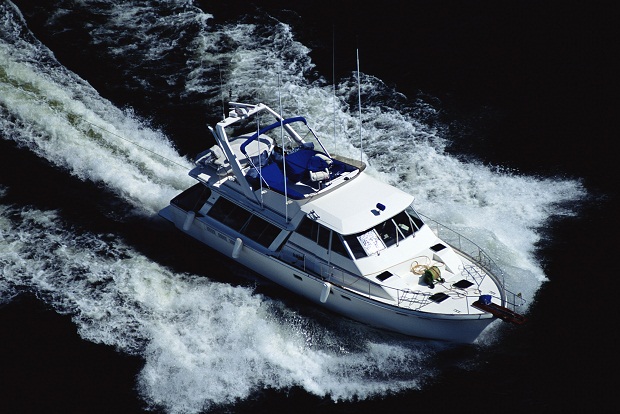 Boat sailing across a body of water