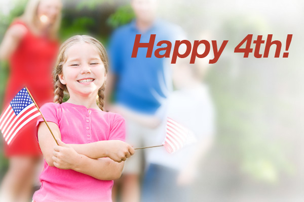 Girl waving American flags