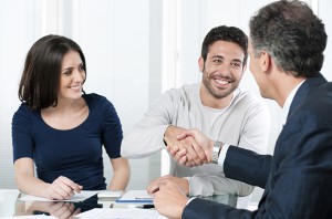 Couple signing a contract