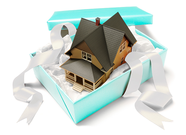 Illustration of a house inside an open gift box