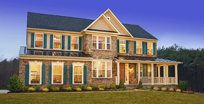 Exterior of two-story home with covered porch