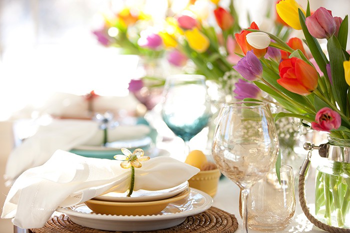 Table set for brunch with floral centerpiece