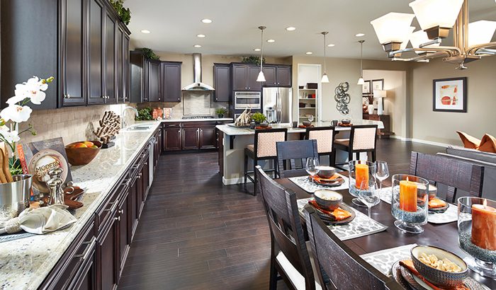 Kitchen with ample cabinets and a table set for a meal