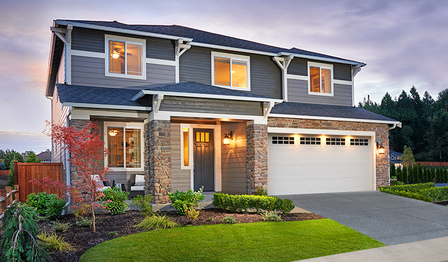 Exterior of two-story home with covered porch