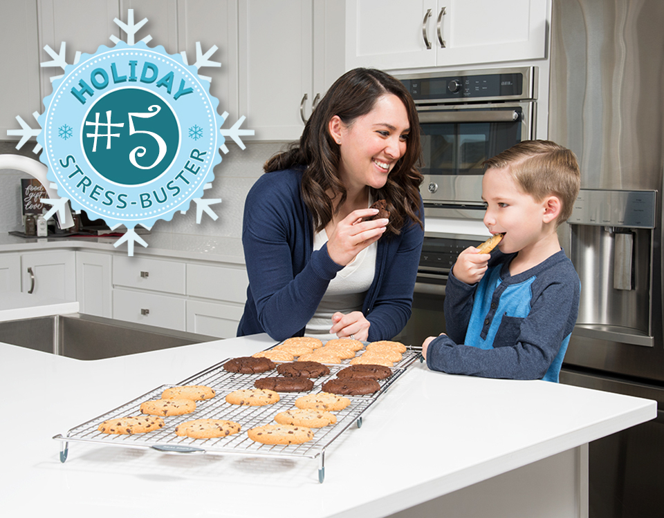 Mom and son sharing fresh-baked cookies