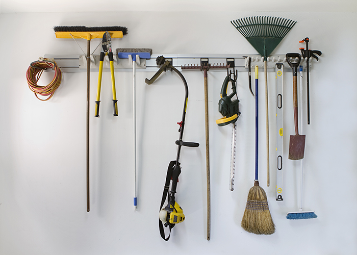 Garage tools on wall hanger
