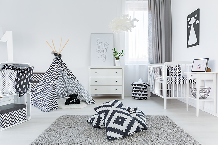 Nursery with white walls and black and white accents