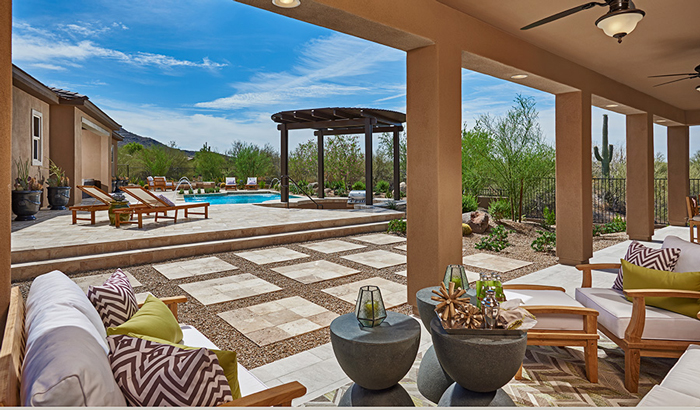 Covered patio, pool and pergola in backyard