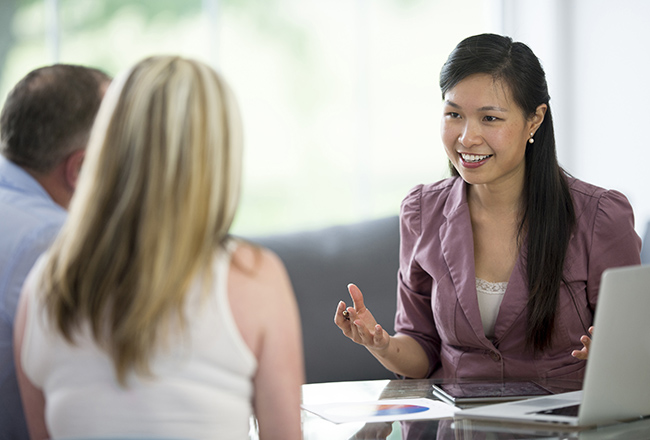 Couple meeting with loan officer