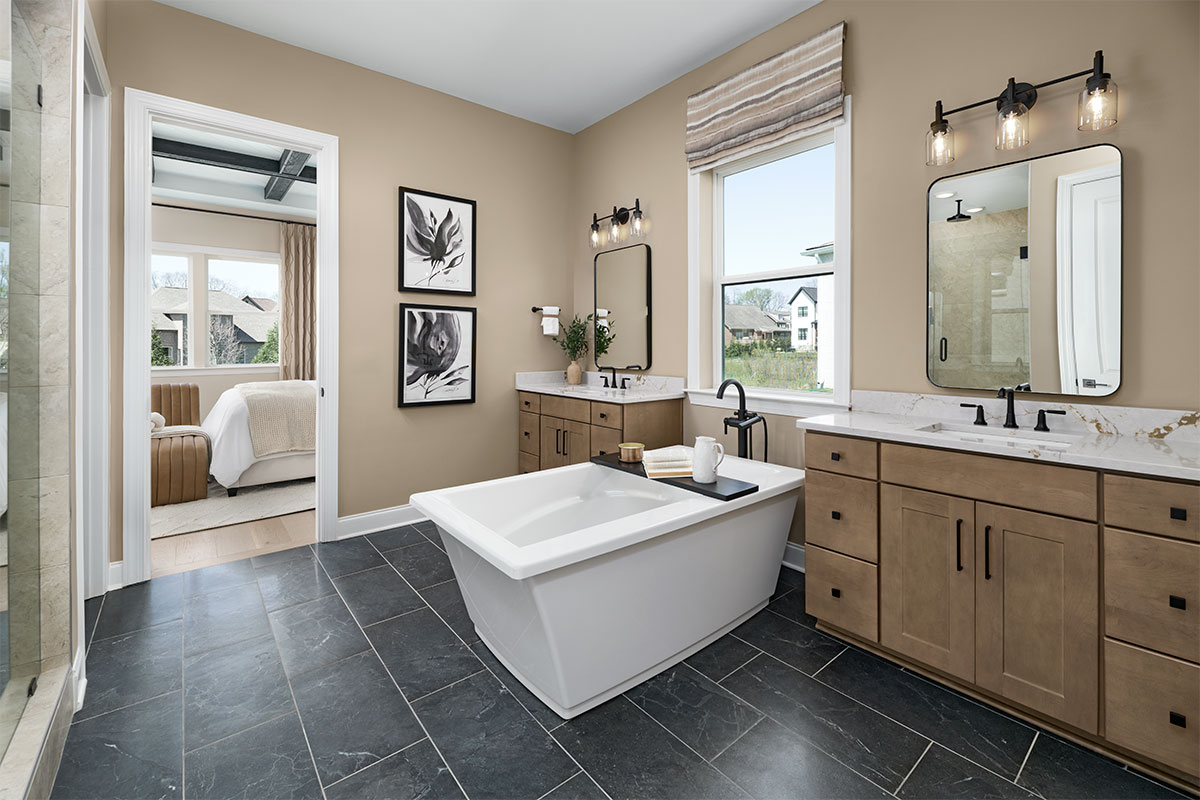 Split double vanity with freestanding tub