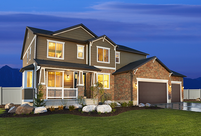 Exterior of two-story home with covered porch