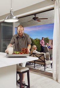 Man holding tray of food