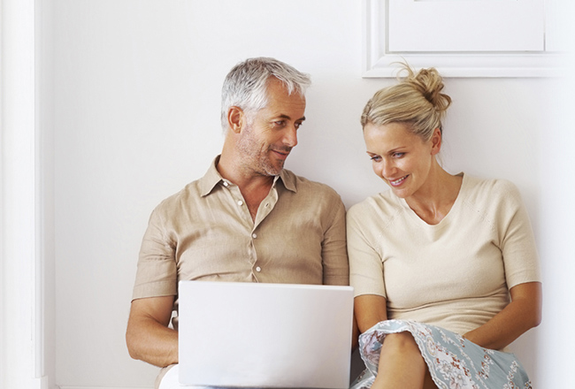 Couple using a computer