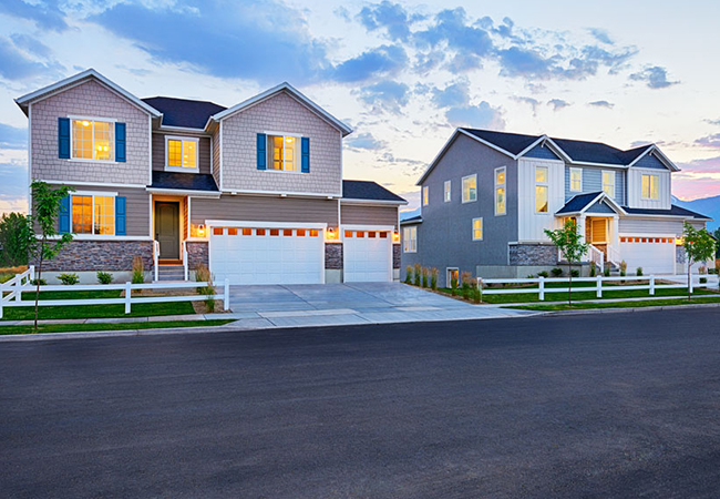 Exterior of two-story home with 3-car garage