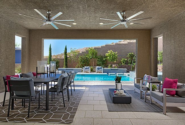 Covered patio with dining table and seating area