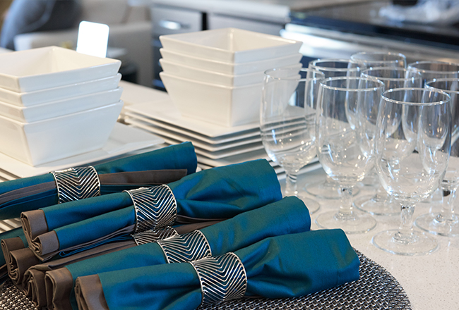 Dishes, glasses and napkins for setting a table