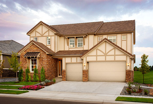 Exterior of two-story home with 3-car garage