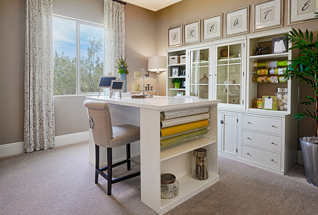 Craft room with island and storage cabinets