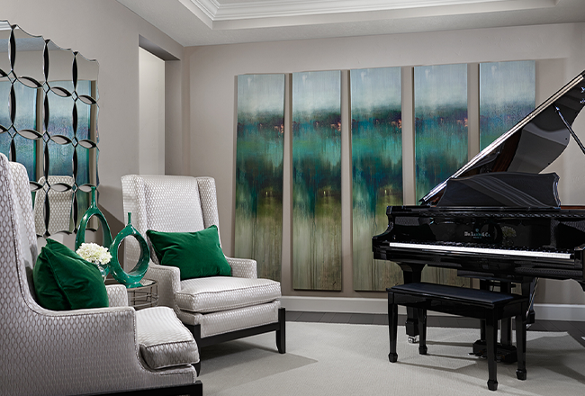 Room with two wingback chairs and a grand piano