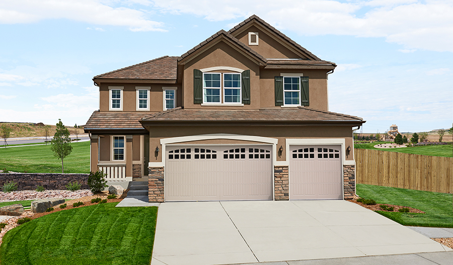 Exterior of two-story home with 3-car garage