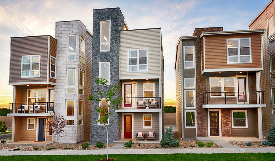 Streetscape of three-story homes with balconies